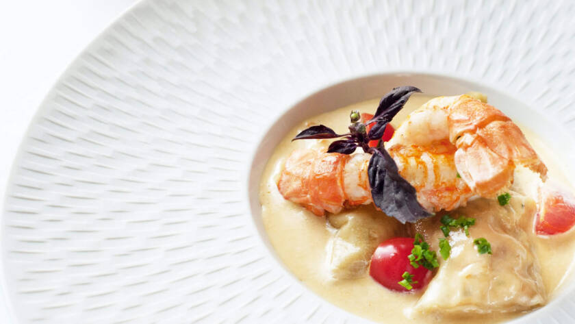 A white plate with some food on it